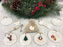 Load image into Gallery viewer, Dog Christmas Decoration - Bone Bauble - White Clay Paw Prints - Dog Bone - Jute Twine
