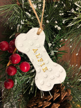 Load image into Gallery viewer, Dog Christmas Decoration - Bone Bauble - White Clay Paw Prints - Dog Bone - Jute Twine