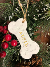Load image into Gallery viewer, Dog Christmas Decoration - Bone Bauble - White Clay Paw Prints - Dog Bone - Jute Twine
