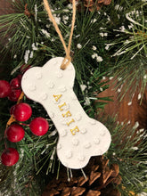 Load image into Gallery viewer, Dog Christmas Decoration - Bone Bauble - White Clay Paw Prints - Dog Bone - Jute Twine