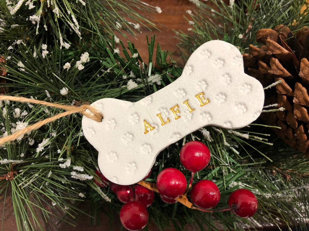 Dog Christmas Decoration - Bone Bauble - White Clay Paw Prints - Dog Bone - Jute Twine