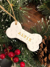 Load image into Gallery viewer, Dog Christmas Decoration - Bone Bauble - White Clay Paw Prints - Dog Bone - Jute Twine
