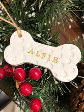 Load image into Gallery viewer, Dog Christmas Decoration - Bone Bauble - White Clay Paw Prints - Dog Bone - Jute Twine
