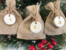 Load image into Gallery viewer, 40 Advent Calendar Bags - Reusable Advent Calendar - 40 White Clay Numbers - Hessian Sacks Bags - Clay Tags - Jute Twine - Christmas Decor
